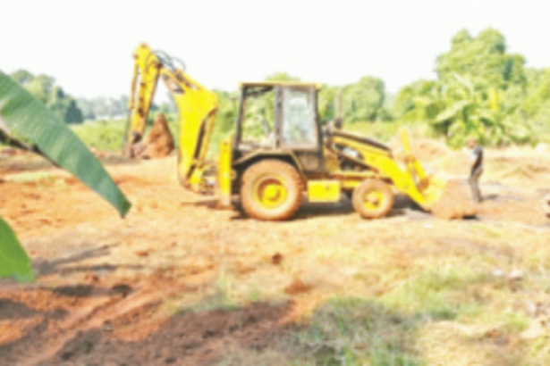 Land filling in low-lying field  stopped at Mapusa, JCB seized