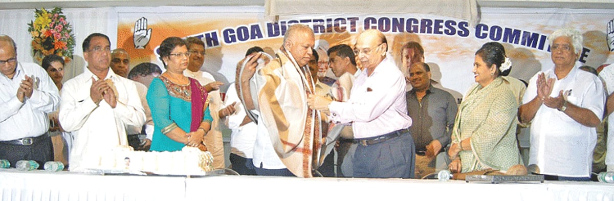Leader of the Opposition, Pratapsing Rane felicitating AICC general secretary Luizinho Faleiro at a function organised by the South Goa district Congress committee on Monday.
