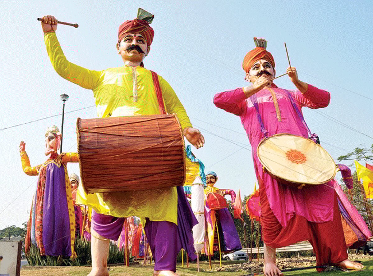 Life size images of folk dancers and musicians are erected for the Shigmotsav 2014 near Sai Service in Porvorim.