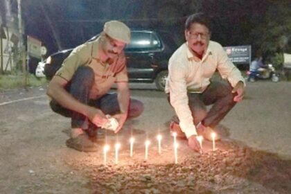 Locals light candles in potholes at Pernem