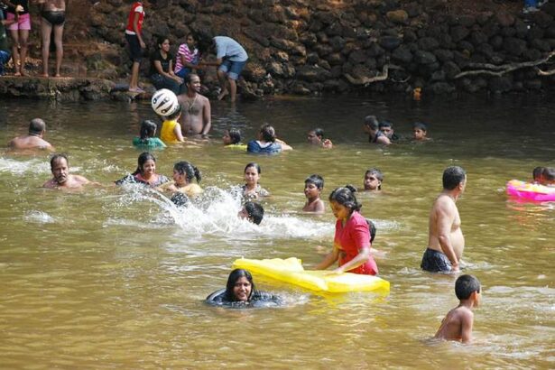 Locals on a picnic at Collem take time to cool off as temprature in the State has been witnessing a sharp rise in recent times..