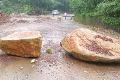 Locals take risk  and ply on  under-construction  closed road via  Anmod Ghat