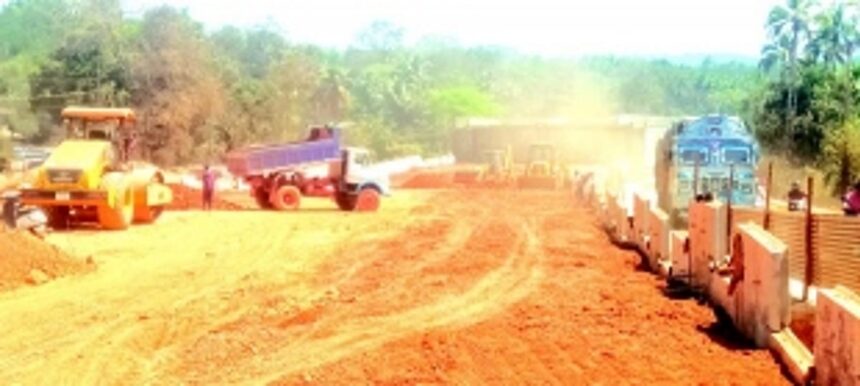 Locals want approach road work leading to Khandepar Bridge expedited to prevent accidents