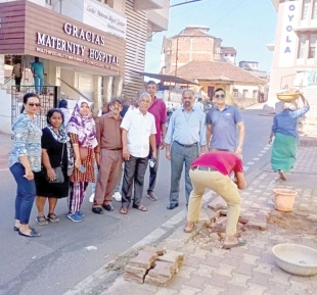 Loyola High School PTA repairs  damaged footpath in Margao