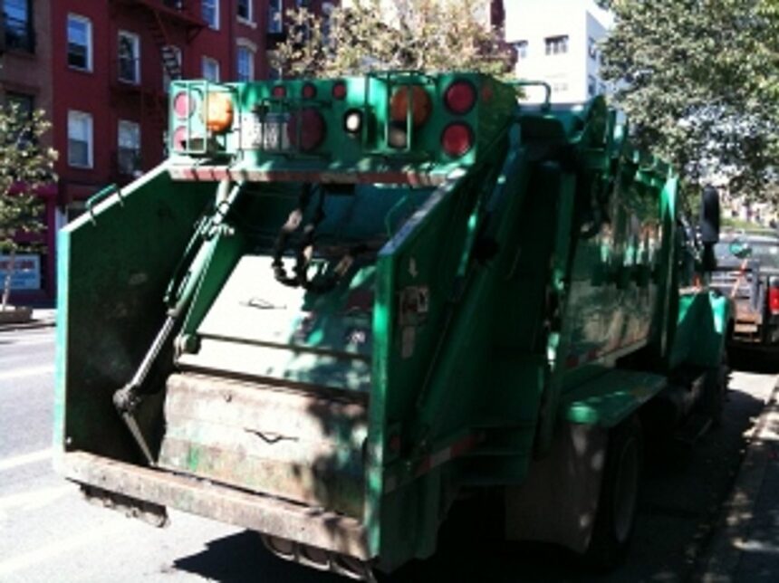 MMC commissions  2 compactor trucks