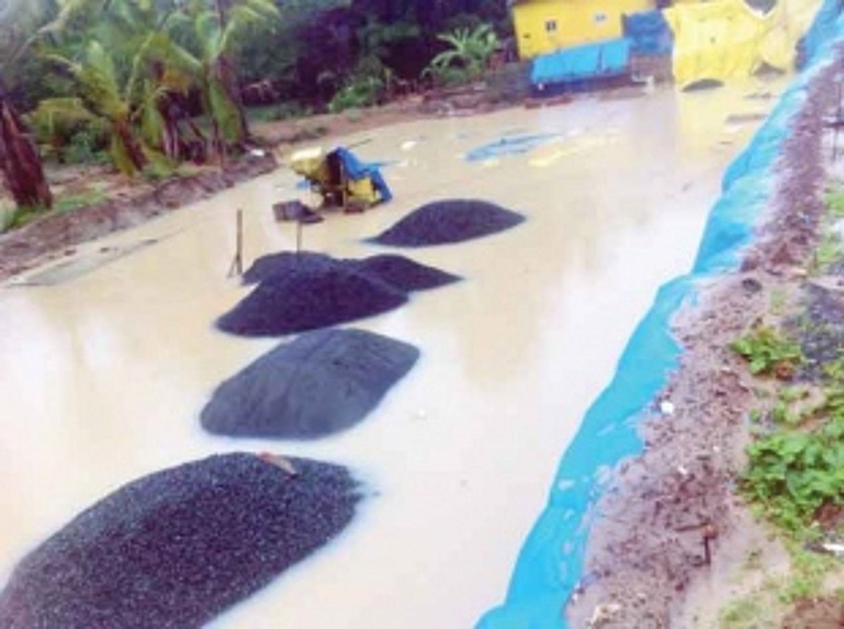 Man-made ‘pond’ at construction site poses threat to house, road