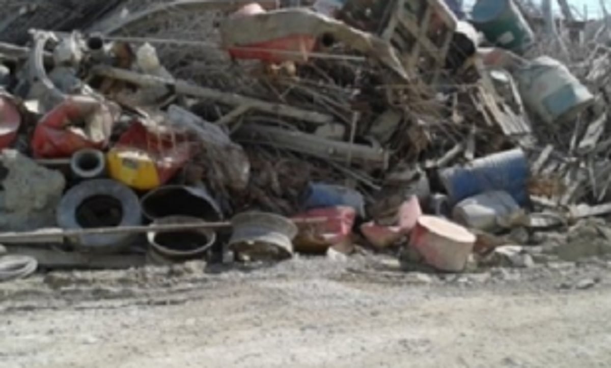 Marcaim locals urge steel  company to clear slag-dump