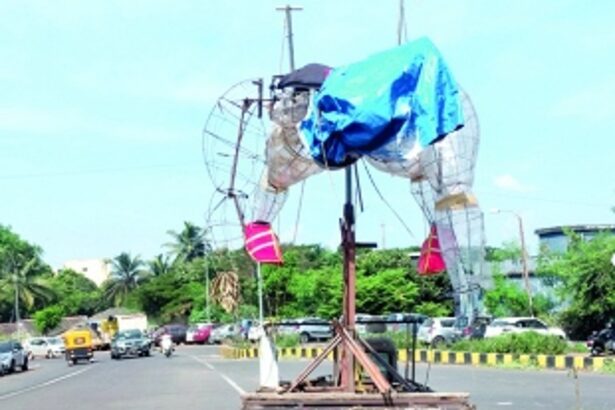 Metal remains of narkasur effigy removed after lying on road for months