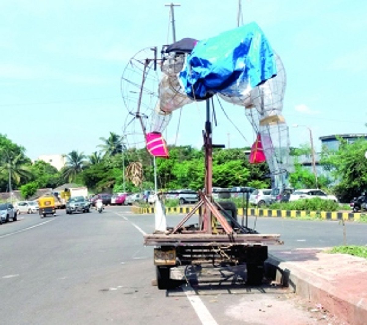 Metal remains of narkasur effigy removed after lying on road for months