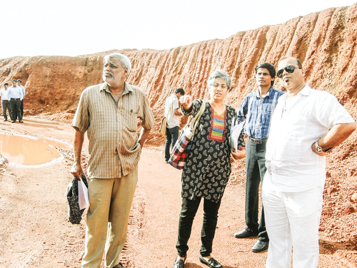Mickky Pacheco takes stock of the hill cutting undertaken by Ms Bloomz International school at Nuvem.