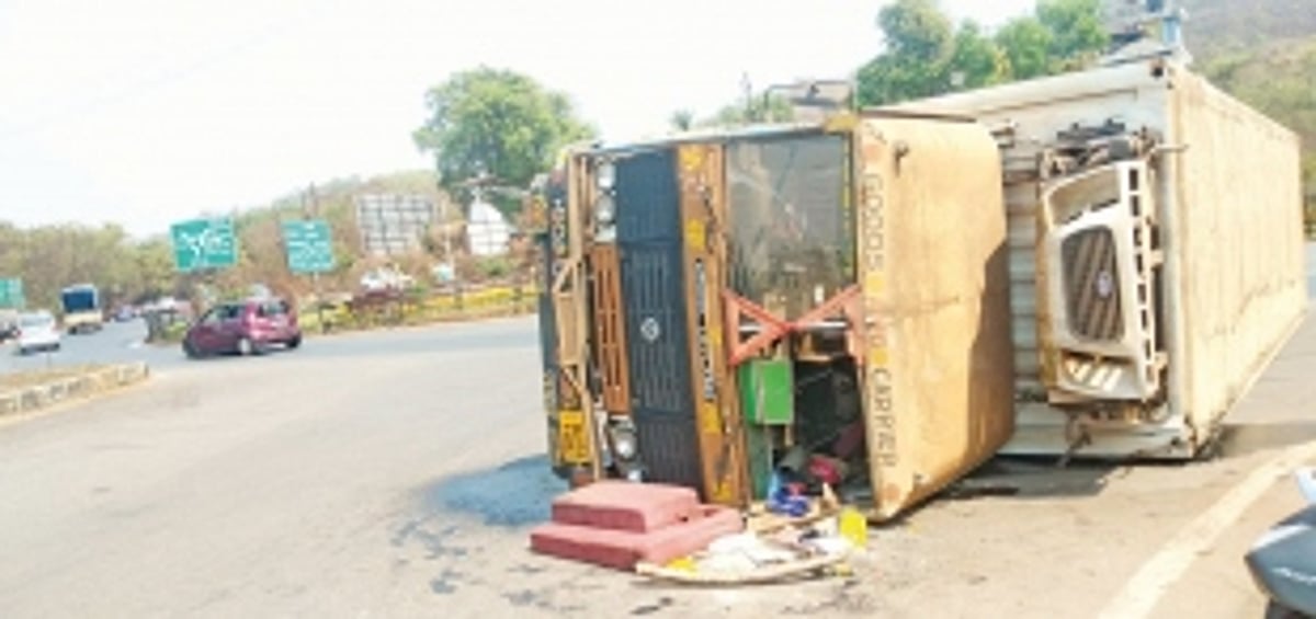 Miraculous escape for 15 students as container truck falls on its side at Ponda