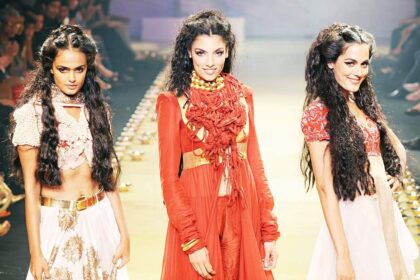 Models walk the ramp to display the creations of designer Anamika Khanna on the final day of The Lakme Fashion Week in Mumbai.