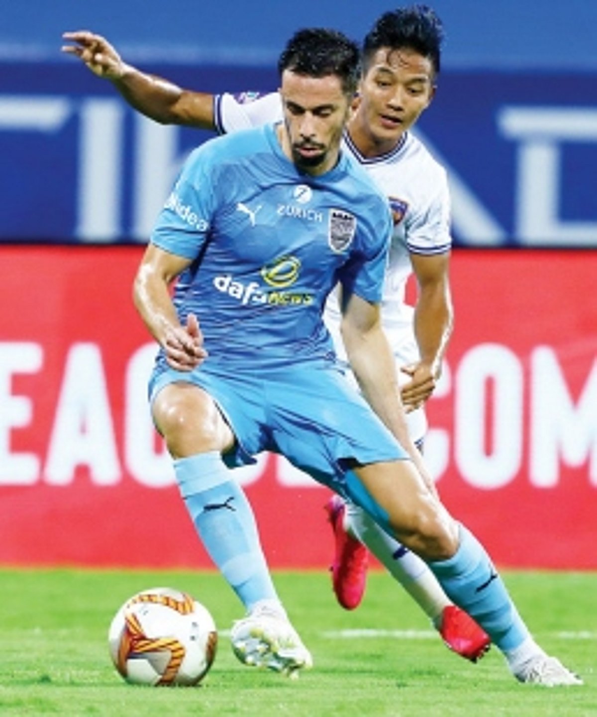 Mumbai extend lead at top