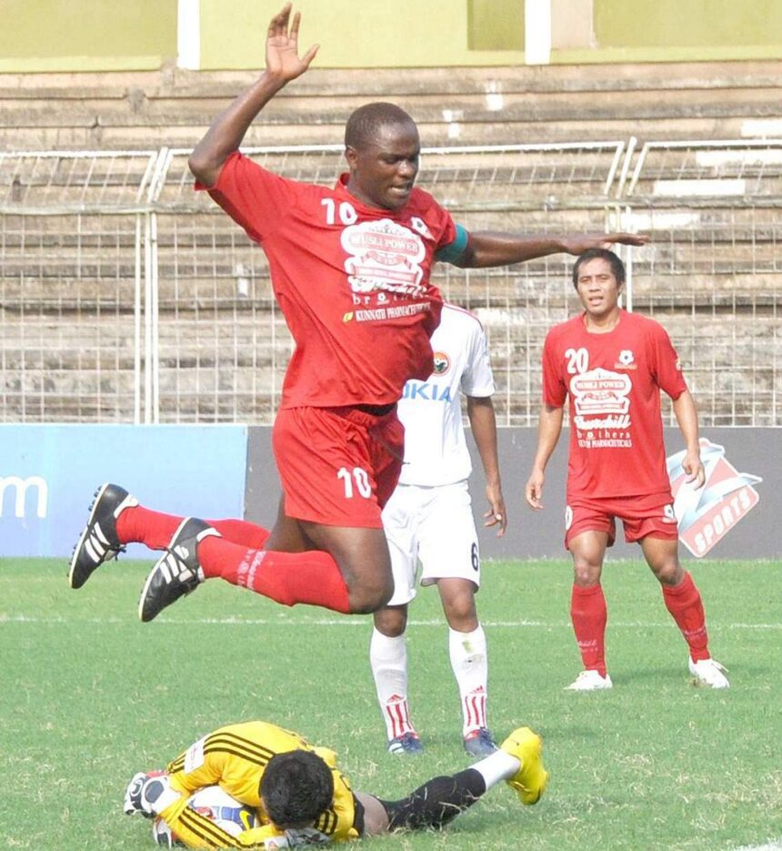 Musli Power Churchill Brothers Odafa Okolie takes a leap to avoid a clash with Shillong Lajong Football Club goalkeeper R Lalthuammawia, as the latter makes a brilliant save. 1 Musli Power Churchill Brothers Odafa Okolie takes a leap to avoid a clash with Shillong Lajong Football Club goalkeeper R Lalthuammawia, as the latter makes a brilliant save.