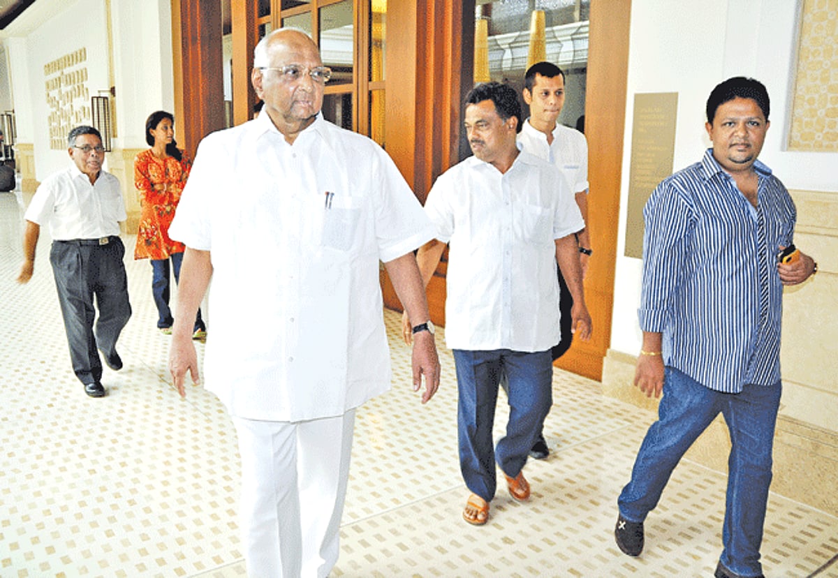 NCP leader Sharad Pawar arrives for the meeting along with Surendra Sirsat, Supriya Sule, State NCP President  Nilkant Halarnkar and Yuri Alemao at Grand Hyatt in Bambolim on Sunday.