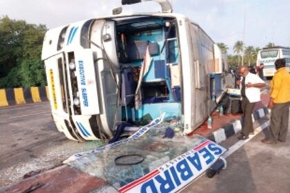 Narrow escape for passengers as  inter-State bus falls on its side at Agasaim