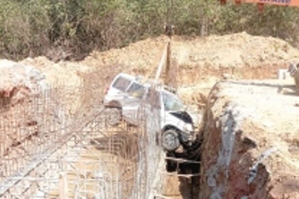 Narrow escape for seven Karnataka tourists as car  falls in pit full of iron rods at Mollem