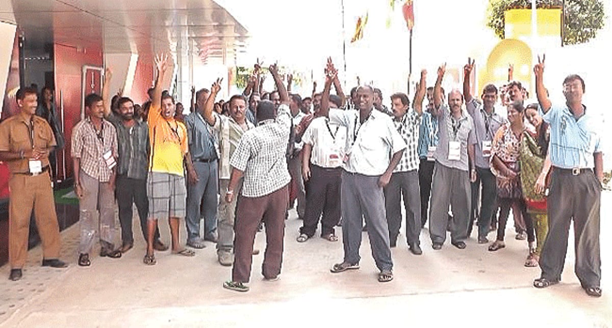 Nehru stadium employees protesting over the denial of entry passes for the Lusofonia games.