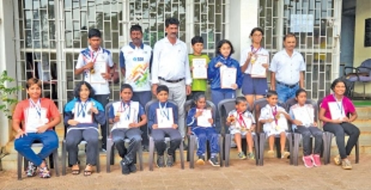 Nigel excels at State swimming