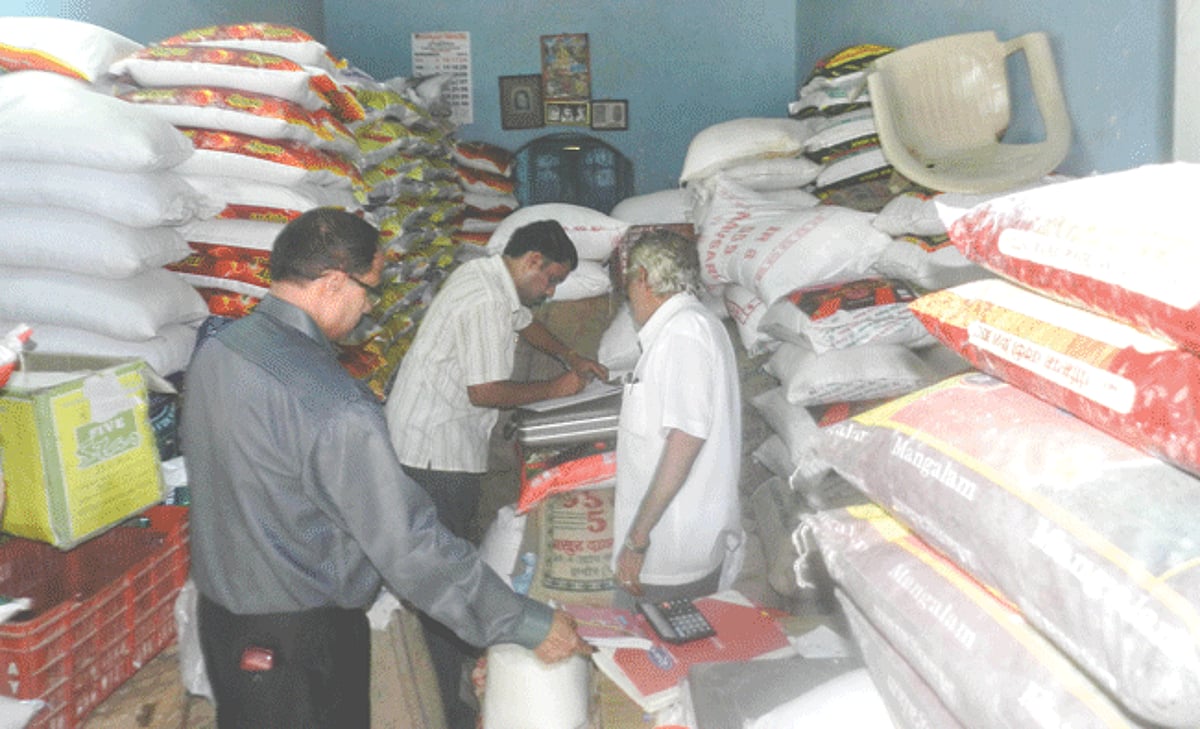 Officials of the Legal Metrology department raid a rice shop at Curchorem on Tuesday.