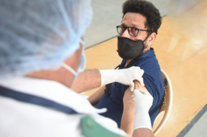 Omicron scare: CM urges public to take  both COVID doses