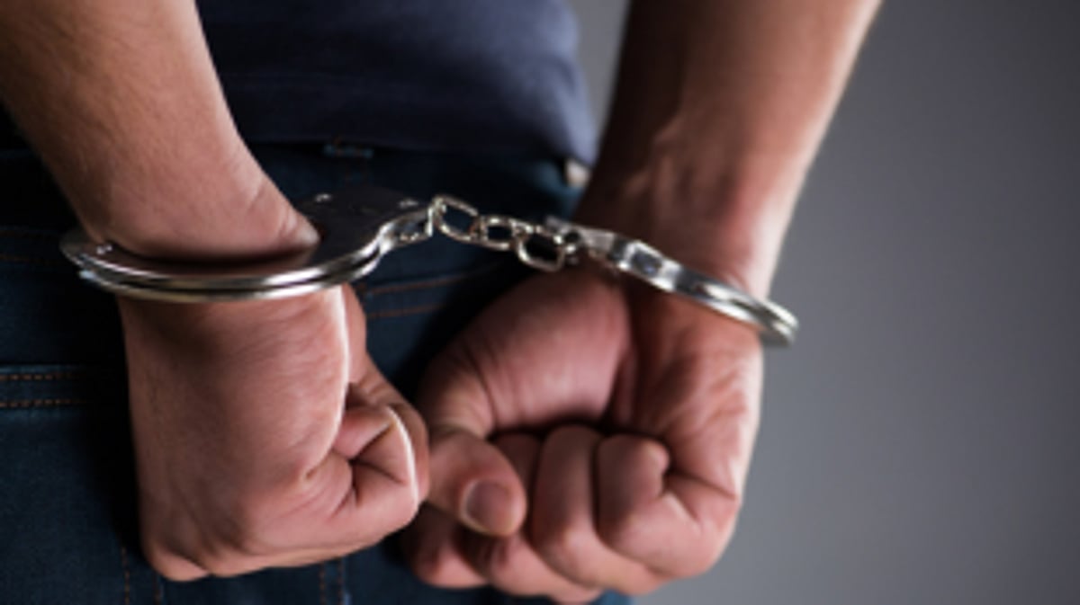 One held in cheating case