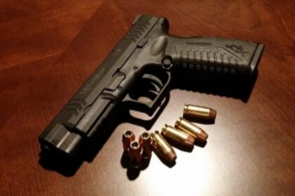 One held with   two pistols,   bullets