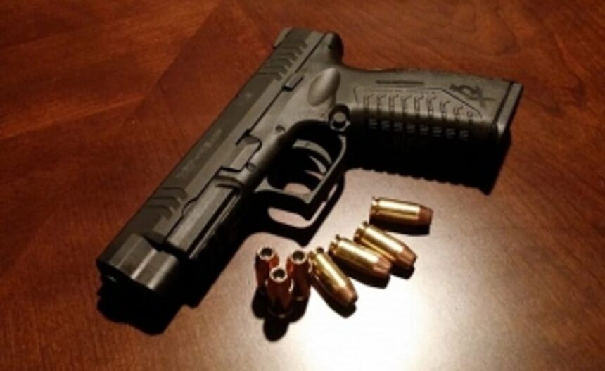One held with   two pistols,   bullets