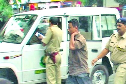 One of the members of a banned outfit from Manipur being taken to Ponda police station.