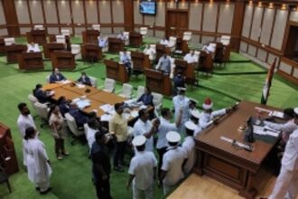 Opposition Members rush to the well of the House on the issue of Chieftains Memorial invitation