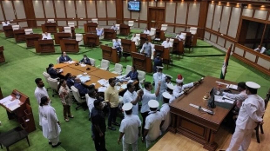 Opposition Members rush to the well of the House on the issue of Chieftains Memorial invitation