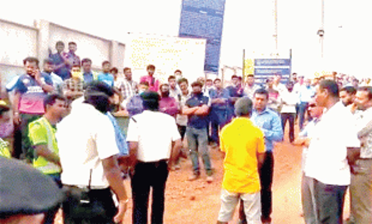 Owners of gutted trucks block Mopa airport main gate