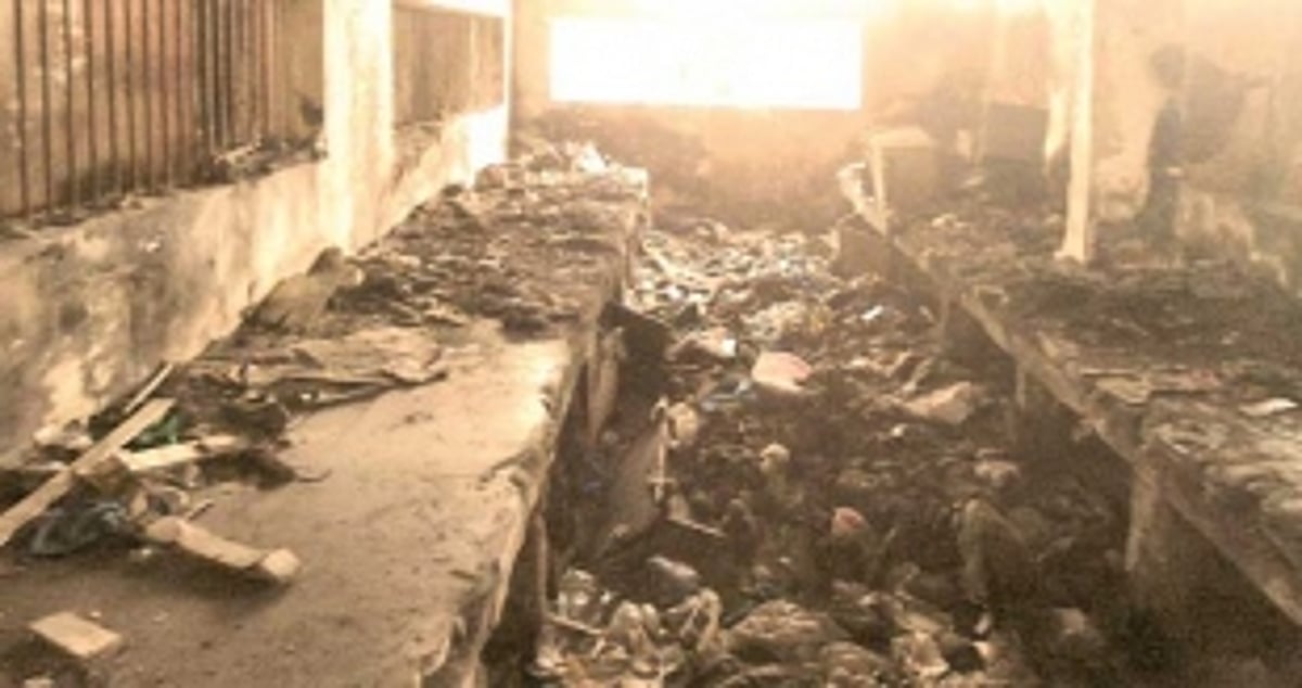 POST INFERNO: CANACONA MARKET  STILL HOUSES ASHES, BURNT GOODS