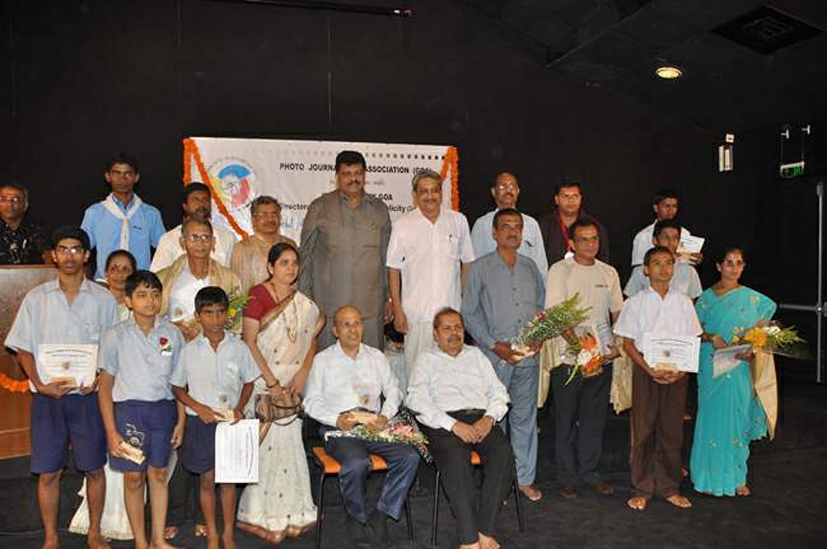 PWD Minister Churchill Alemao along with the Opposition Leader Manohar Parrikar with the students, former photo journalists and life time achievement awardees on the occasion of World Photography Day at Kala Academy.