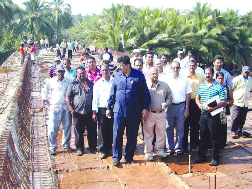 PWD Minister Churchill Alemao inspecting work on the Telaulim-Varca bridge over River Sal.