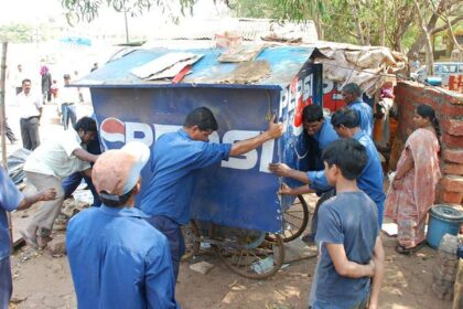 PWD workers lift an illegal kiosk outside the GMC Hospital, Bambolim.