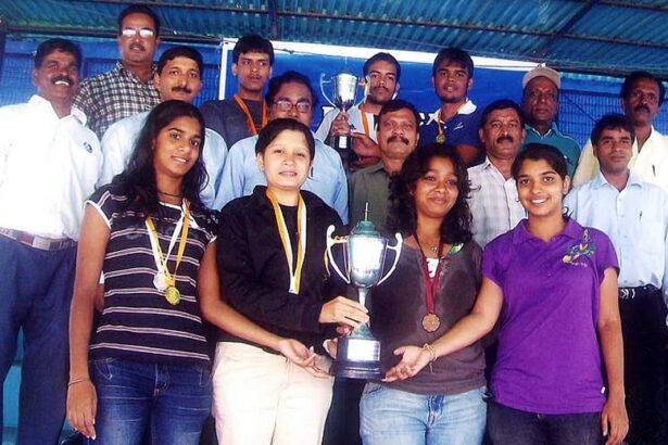 Padre Conceissao College of Engineering and Damodar College teams, winners of inter-college swimming championship alongwith R N Tari, Milton Fernandes and others.