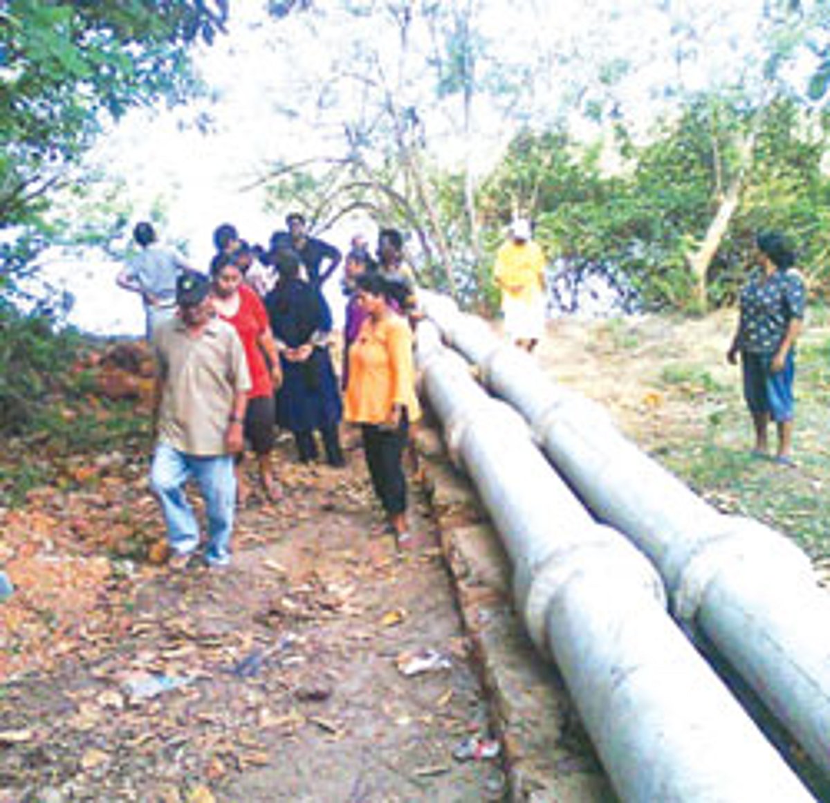Panchayat members inspecting the controversial pipeline laid by  Rahejas