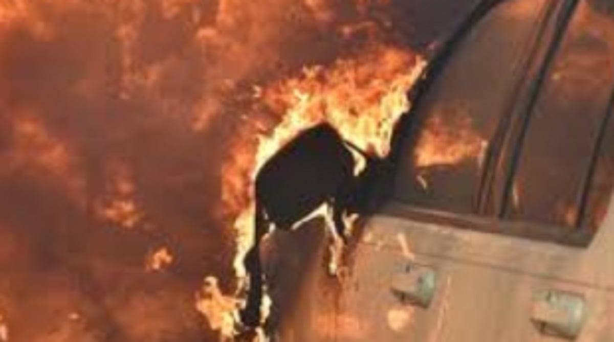 Parked   vehicles   catch fire