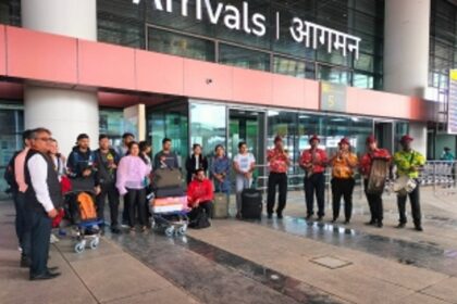 Passengers on first flight that lands at Mopa airport break into a jig on arrival