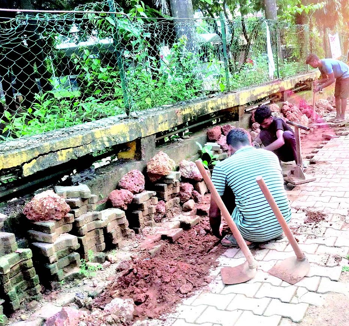 Pavers being relaid on pavement in Vasco