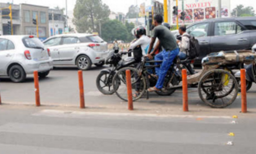 Penalise drivers who park on zebra crossings