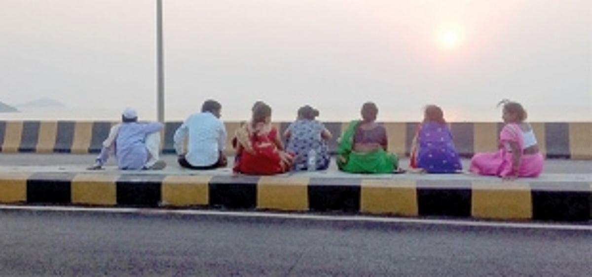 People are using a road median for multiple purpose at Vasco