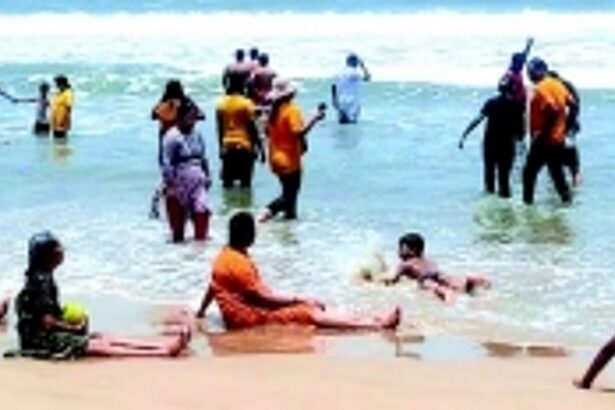 People throng Baga Beach for ‘health boosting’ summertime dip