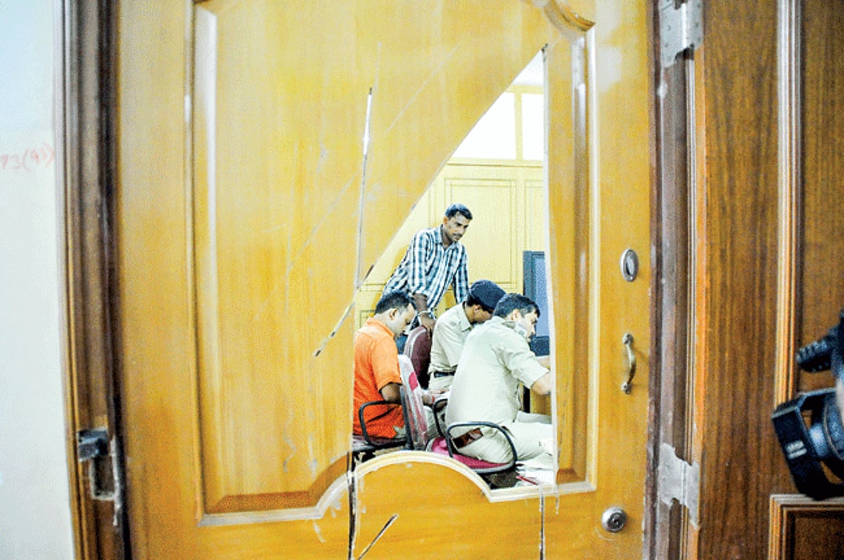 Police officials conduct panchanama at the office of Co-operation Minister Deepak Dhavalikar.