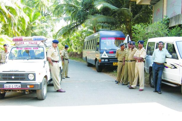 Policemen stand guard at the residence of Mickky Pacheco on friday.       Photo by vilino Fernandes