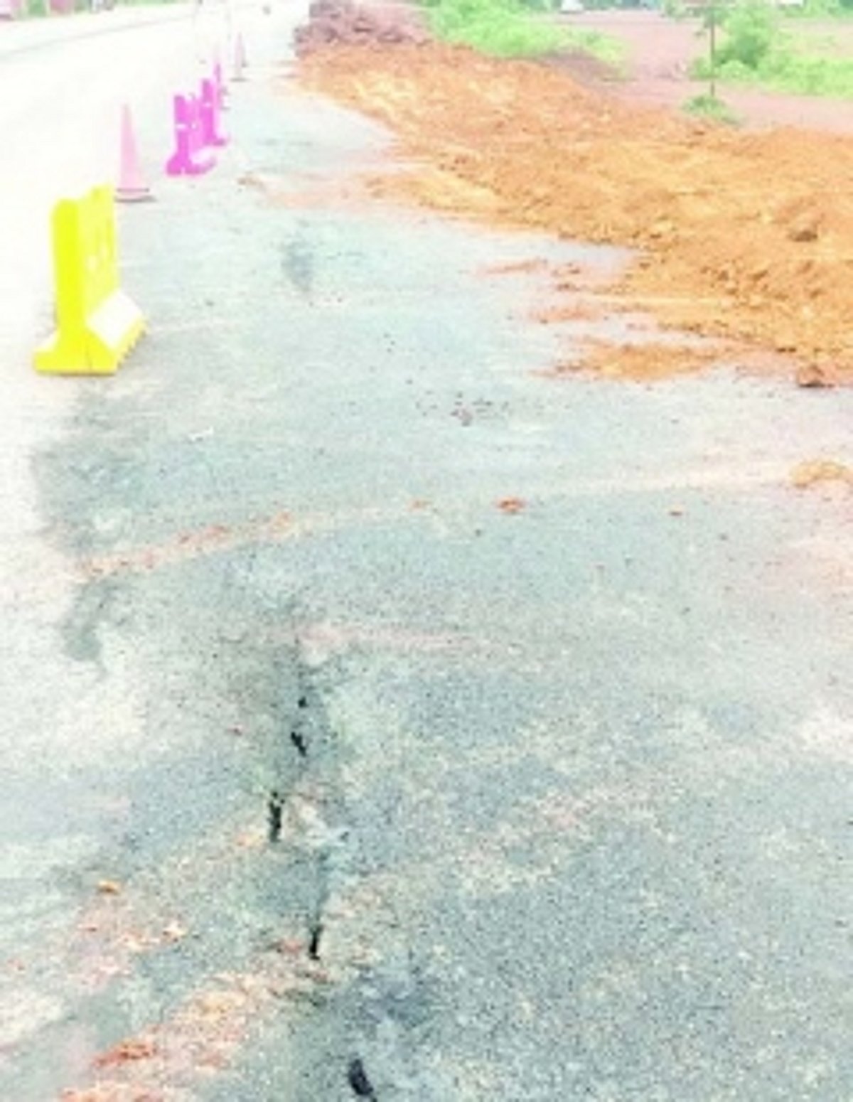 Portion of newly tarred road  gives way at Bethora-Borim NH