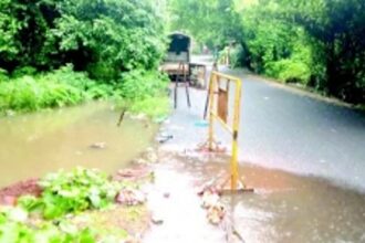 Portuguese-era cross drain at Kavlem choked with mud, plastic, debris