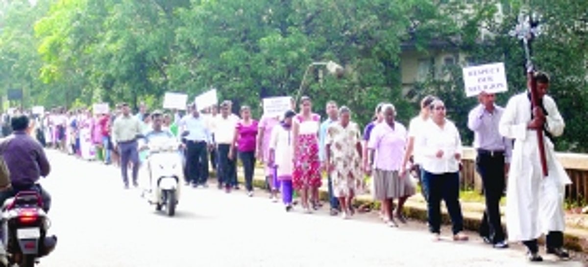 Protest march over desecration of cross at Sankhali