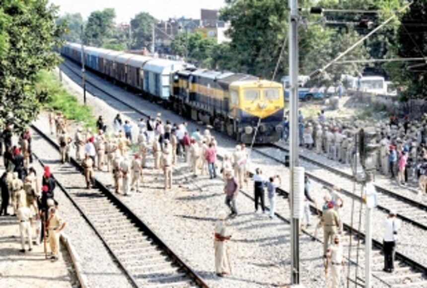Punjab police commando, photojournalist injured as protesters clash with cops